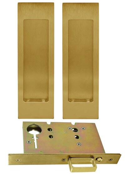 Premium Pocket-Door Mortise Lock Set with Rectangular Pulls in Aged Brass.